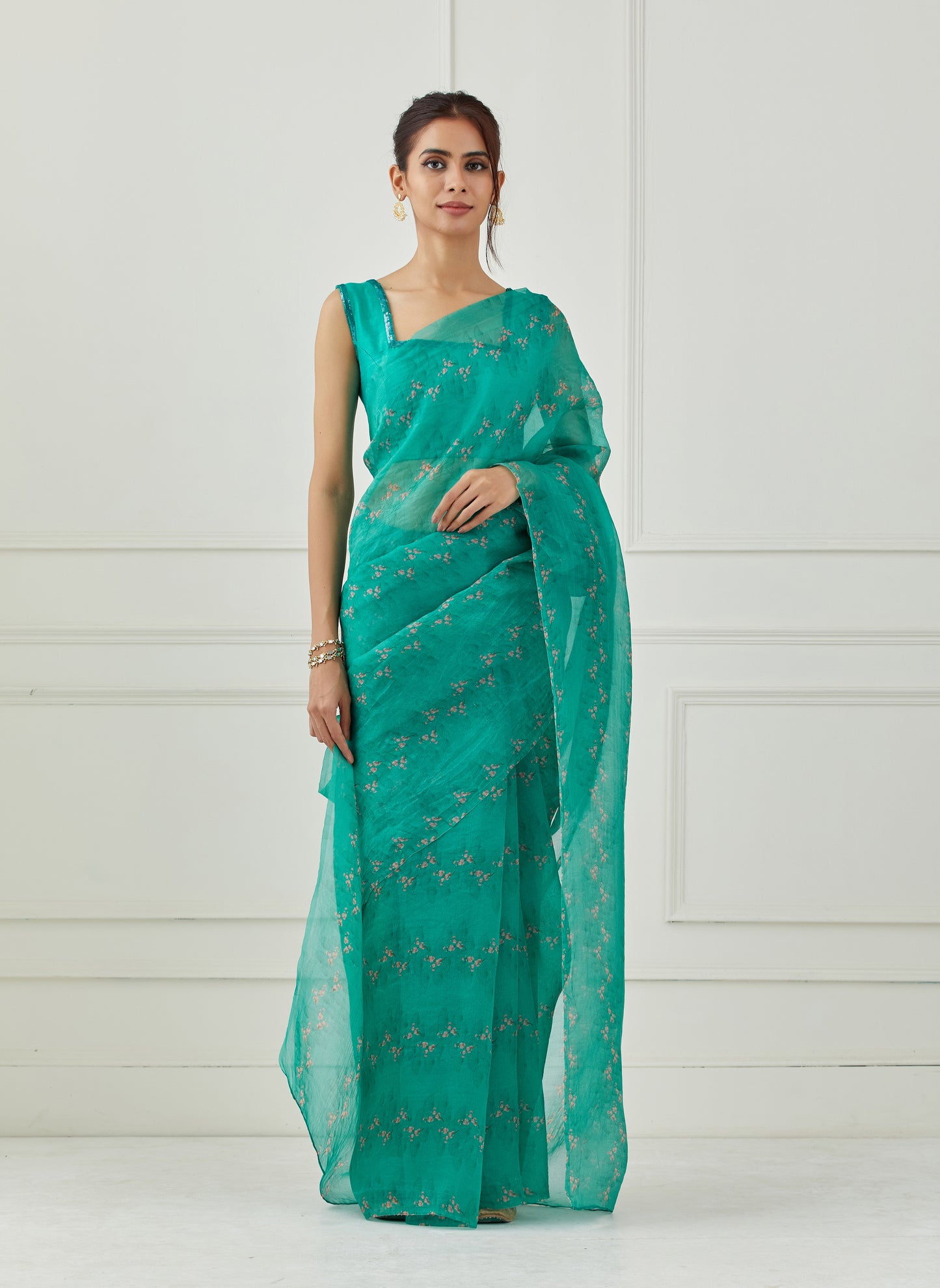 Teal Organza saree(unstitched blouse)
