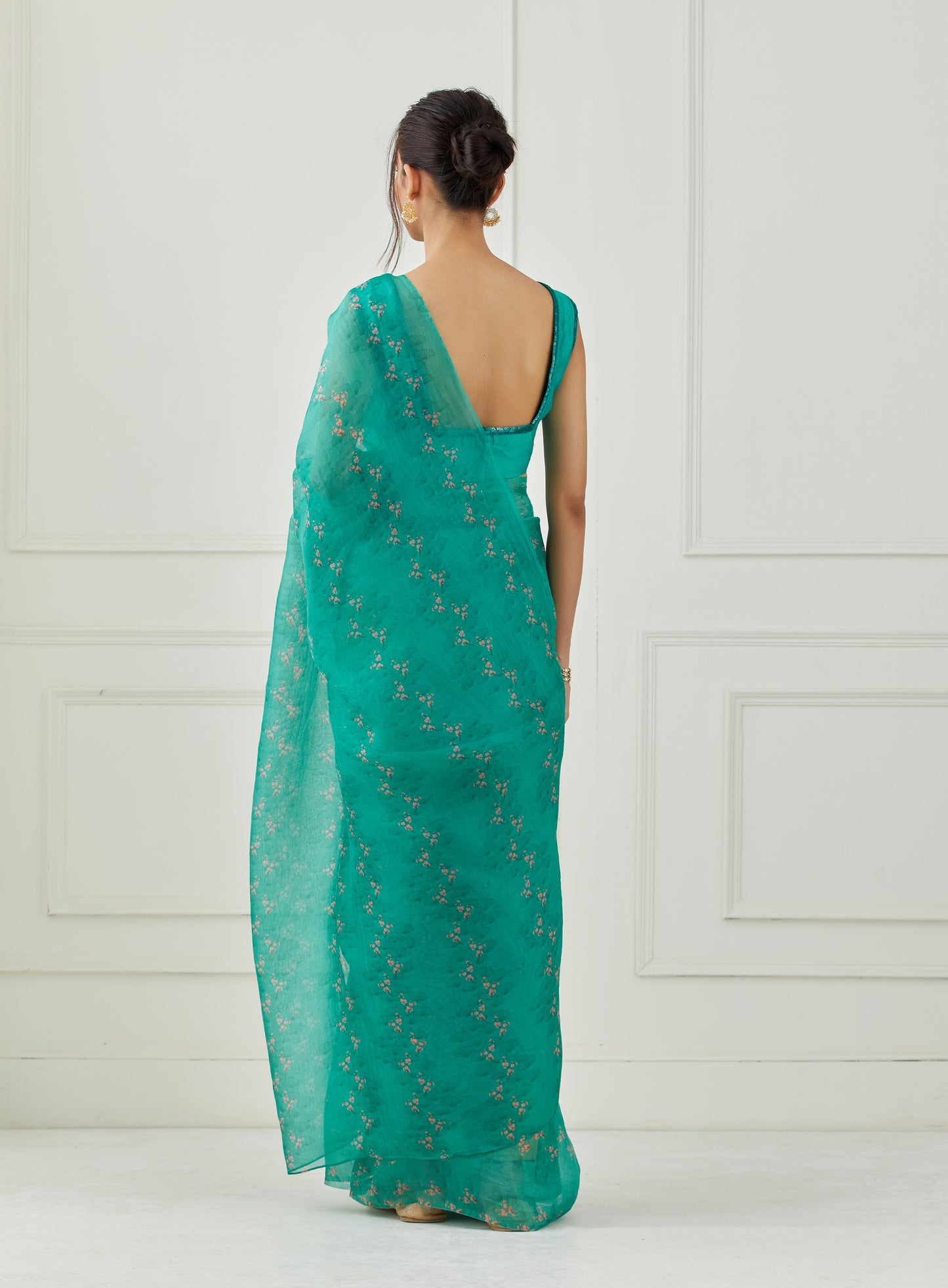 Teal Organza saree(unstitched blouse)