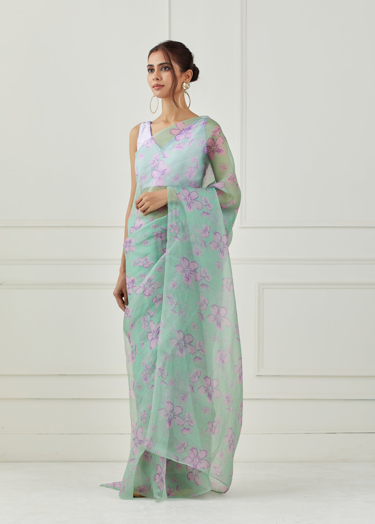 Mint green organza saree (Unstitched blouse)