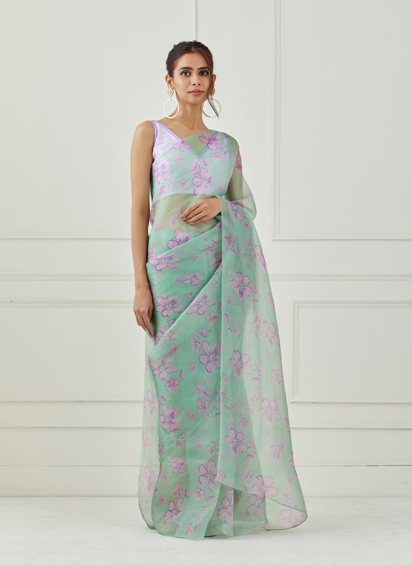 Mint green organza saree (Unstitched blouse)
